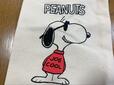 【スヌーピー ミニ巾着】ニヤッと笑ったクールなスヌーピー