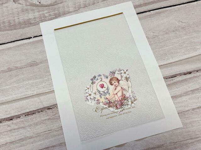 ホワイトのレース模様入りのクリアバッグ