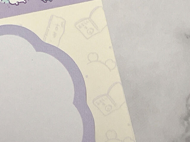 台紙は古本屋の旗やカニちゃんの本、カニカチューシャなどの総柄