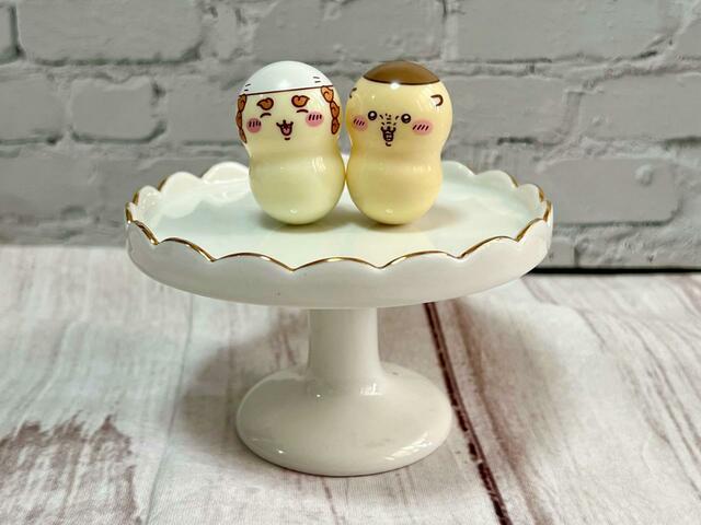 お酒の資格を取るための勉強をくりまんじゅうに教わっているシーサー！