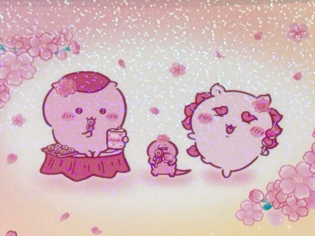 裏面上部には、お団子を食べながらお花見を楽しむキュートなくりまんじゅう＆シーサーが登場♪