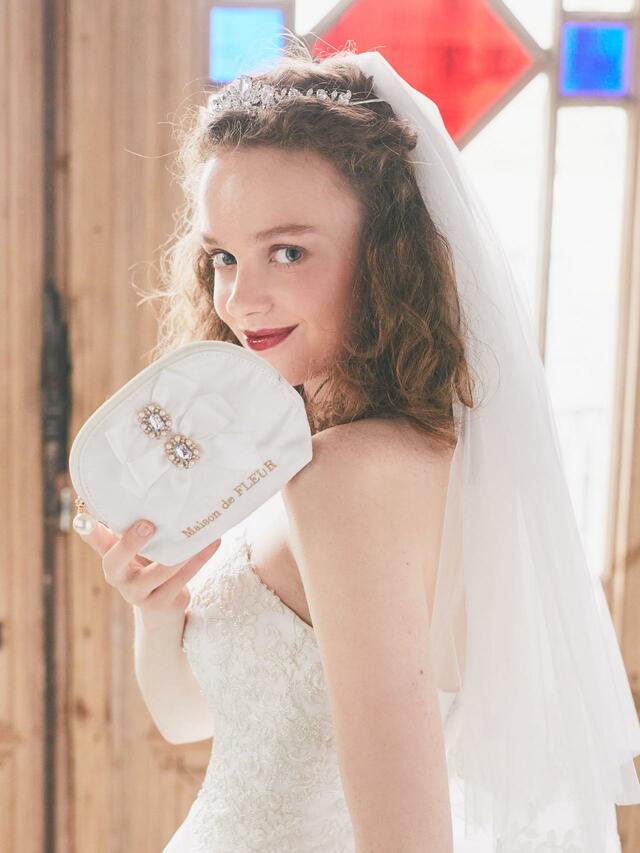 ビジューリボンラウンドポーチ  価格：￥4,500