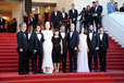 CANNES, FRANCE - MAY 19:  (L-R)  Actors Byung Heebong, Giancarlo Esposito, Steven Yeun, Tilda Swinton and Ahn Seo-Hyun, director Bong Joon-Ho and actors Paul Dano, Lily Collins, Jake Gyllenhaal and Devon Bostic attend the 