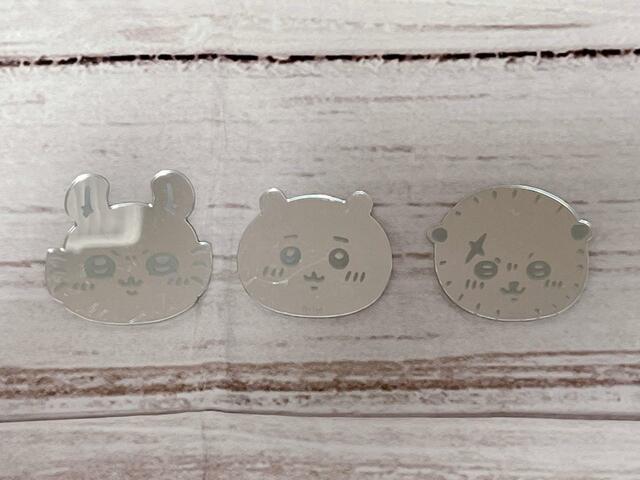 東京みやげトレーディングおかおミラーステッカー／各税込440円。ブラインド仕様のため、開けるまでキャラがわかりません