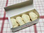 箱を開けたら、おいしそうな豚饅がきれいに並んでいた／東京豚饅