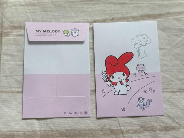 Aは小道をお散歩するマイメロディのイラスト