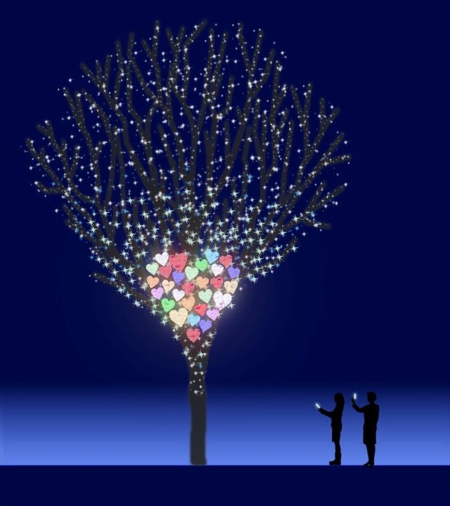 ② 今年初となるスマホ連動企画「TOUCH the HEART」。スマートフォンでアクションを与えると、ハート型イルミの色や動きが変化する（六本木ヒルズ）