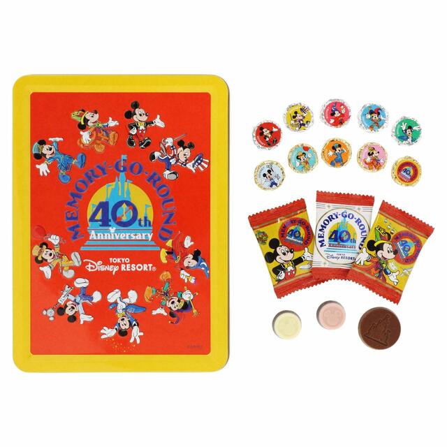 アソーテッド・チョコレート 1,700円|内容量:116g(26個)〔ホワイト&スウィート10個、ストロベリー風味&スウィート10個、ミルク6個〕|東京ディズニーリゾート40周年“ドリームゴーラウンド”「MEMORY-GO-ROUND」グッズ|発売日:2023年6月13日(月)|販売店舗:東京ディズニーランド「グランドエンポーリアム」、東京ディズニーシー「エンポーリオ」