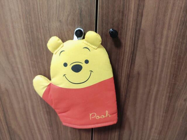 壁にかけられる